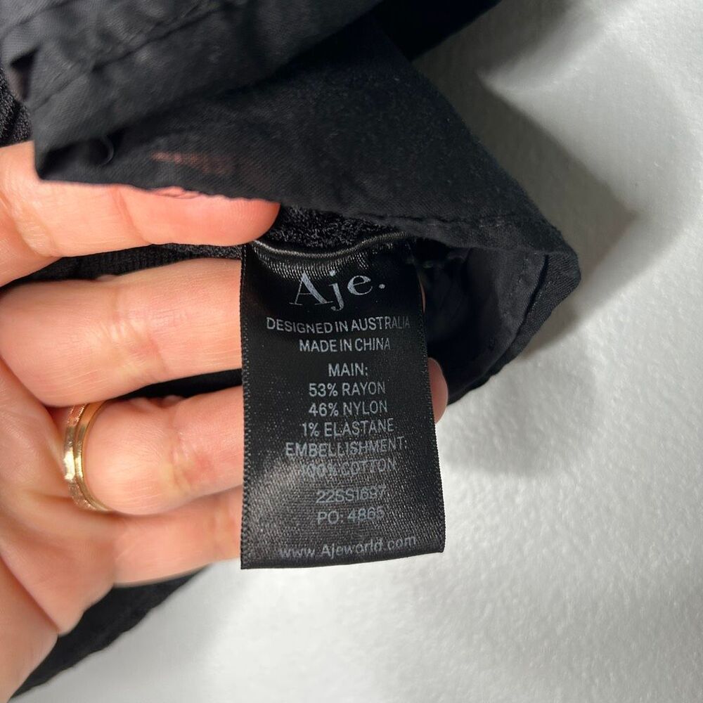 Aje. Corinne Ruffled Ribbed Crop Top - Black - Picture 10 of 11